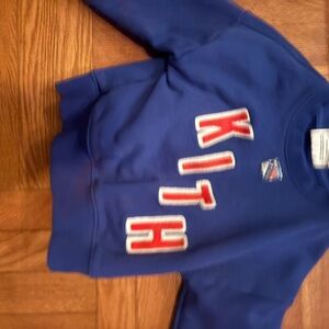 Kith Blue Crewneck Sweatshirt with Red and White Appliqué